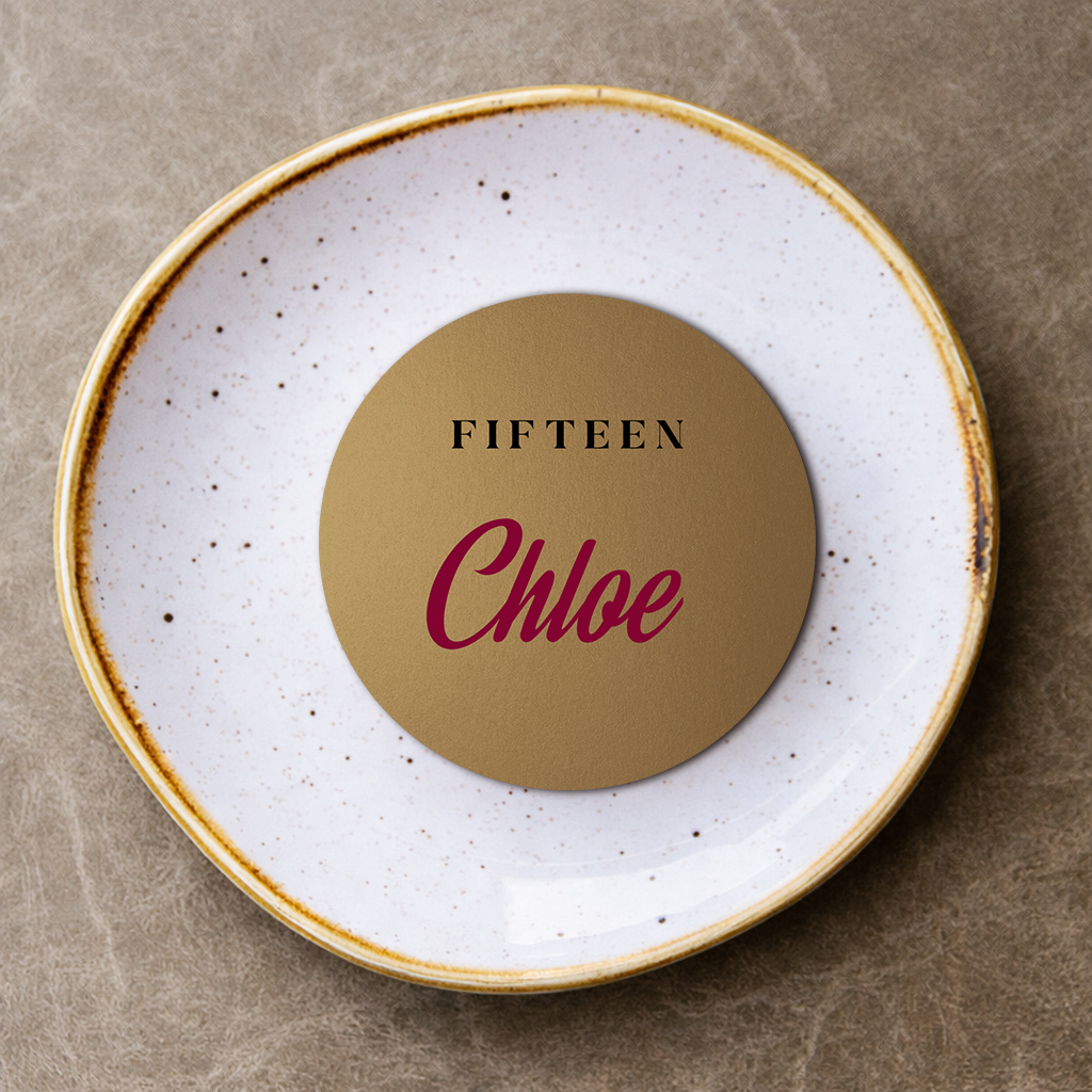 Round place card featuring 'FIFTEEN Chloe' text on a brown background.