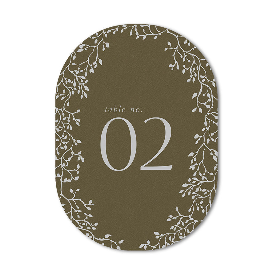 Table number card with leaf border on a brown cardstock