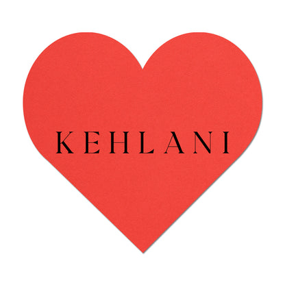 Red heart name card with 'KEHLANI' text on a white background