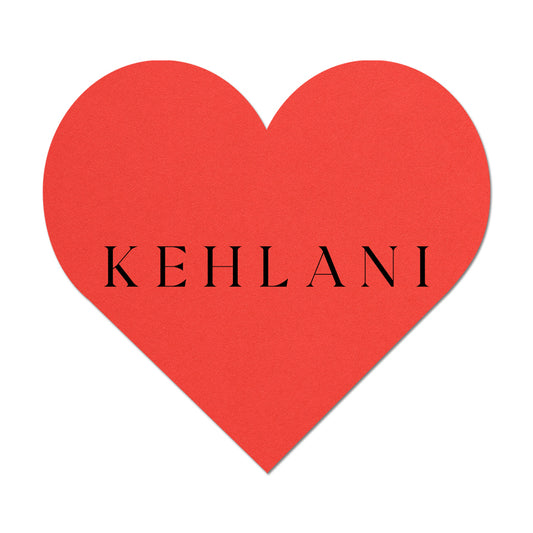 Red heart name card with 'KEHLANI' text on a white background