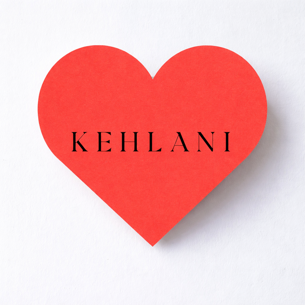 Red heart-shaped card with 'KEHLANI' text on a white background