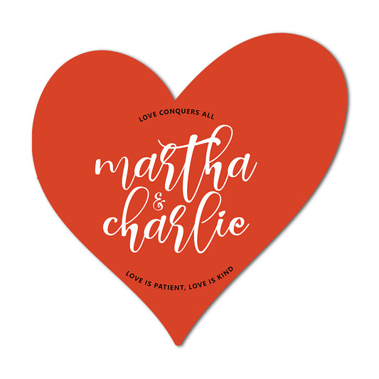 Red heart-shaped send-off tag with 'martha & charlie' text on a white background