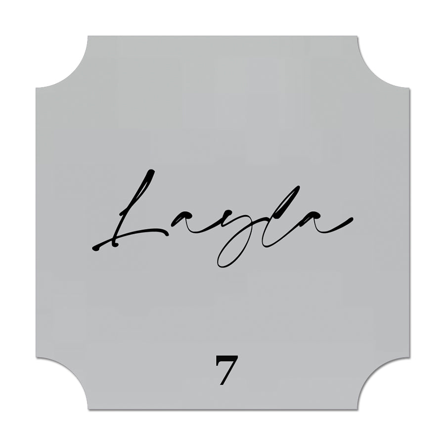 Decorative name card with 'Layla' and number '7' on a gray background