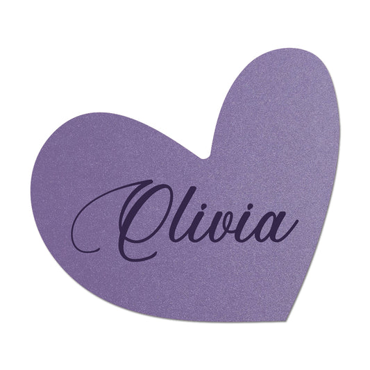 Heart-shaped purple name card with 'Olivia' engraved on a white background
